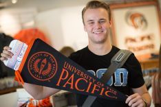 student with Pacific penant